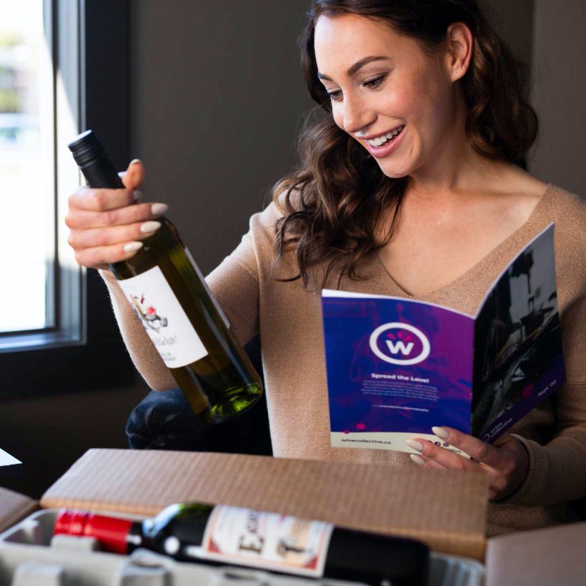 fulfillment Women opening wine subscription box from Wine Collective