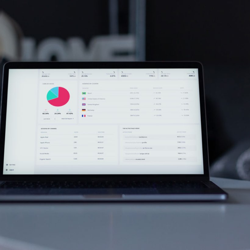 Logistics stats on a laptop screen.