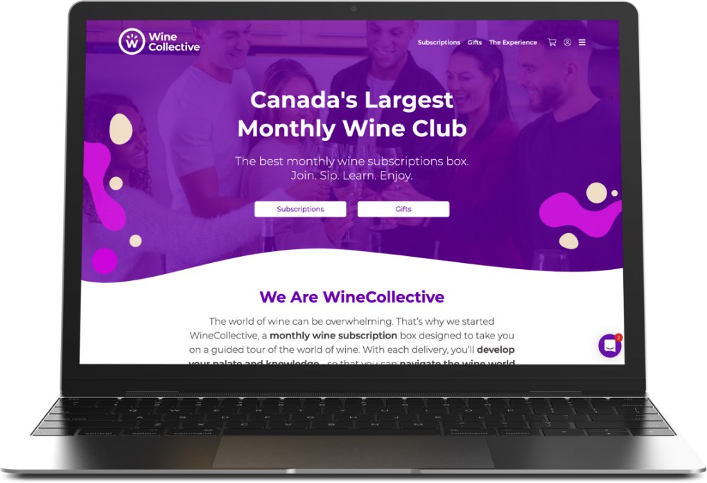 Wine Collective website on laptop.